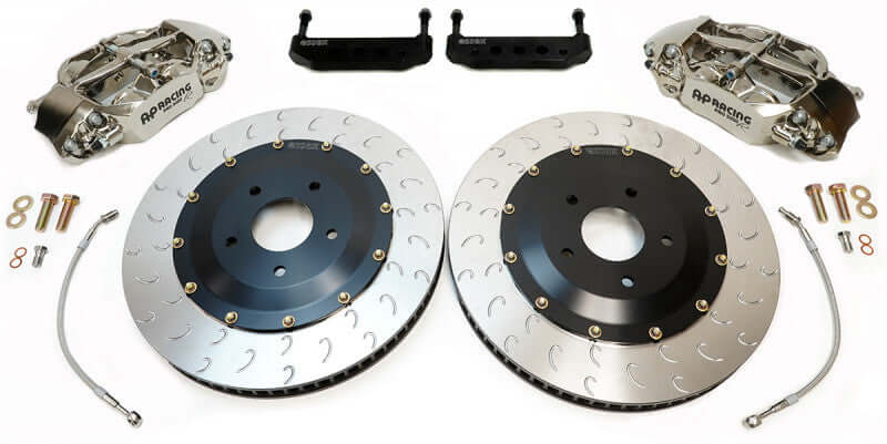 AP Racing rear brake kit components including calipers, rotors, and hardware for C5/C6 Corvette competition use.