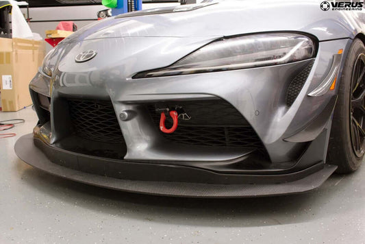 Verus A90 Supra Front Splitter installed on a Toyota Supra, showcasing enhanced aerodynamics and downforce.