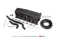 AMS Performance Toyota GR Supra intake manifold with fuel rail, hoses, and hardware for enhanced engine performance.
