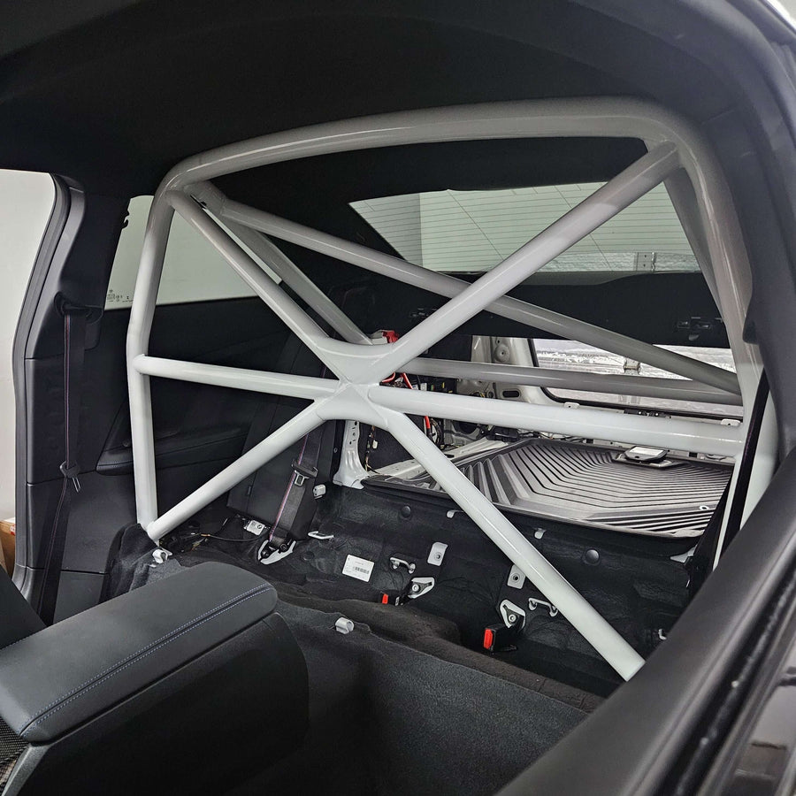 WPM G87 M2 Clubsport Half Cage installed in a car interior, enhancing safety and structural support.