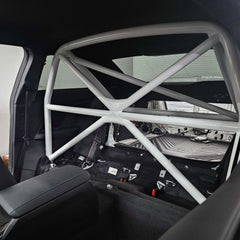 WPM G87 M2 Clubsport Half Cage showing a white safety roll cage inside the car's rear interior.